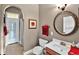 Bathroom featuring a single sink vanity, ceramic tile floors and neutral walls at 4016 Atalaya Pl., Myrtle Beach, SC 29579