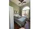 The light-filled bedroom boasts a large window and plush bedding, creating a cozy and inviting space at 4016 Atalaya Pl., Myrtle Beach, SC 29579