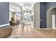Inviting foyer with arched doorways and tiled flooring leading to dining area at 4016 Atalaya Pl., Myrtle Beach, SC 29579