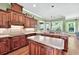 Well-appointed kitchen featuring custom cabinetry, stone countertops, and stainless appliances at 4016 Atalaya Pl., Myrtle Beach, SC 29579