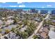 Aerial view of condo complex surrounded by lush greenery, beach and community parking at 404 72Nd Ave. N # 206, Myrtle Beach, SC 29572