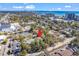 Aerial view of condo complex surrounded by lush greenery, beach and community parking at 404 72Nd Ave. N # 206, Myrtle Beach, SC 29572