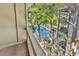 View from the balcony showing the community pool and surrounding landscaping at 404 72Nd Ave. N # 206, Myrtle Beach, SC 29572