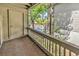 This covered balcony offers a private space to relax and enjoy views of the community pool at 404 72Nd Ave. N # 206, Myrtle Beach, SC 29572