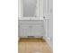 Clean bathroom featuring a white vanity, and neutral walls, for a minimalist and functional space at 404 72Nd Ave. N # 206, Myrtle Beach, SC 29572