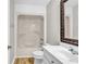Cozy bathroom featuring a shower and tub combination, white toilet and sink, and a decorative mirror at 404 72Nd Ave. N # 206, Myrtle Beach, SC 29572