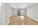 Sun-filled living area with hardwood floors and natural light, creating a warm and inviting space for relaxation at 404 72Nd Ave. N # 206, Myrtle Beach, SC 29572