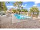 Inviting community pool area with lounge chairs, shade trees, and clear water in well-kept facilities at 404 72Nd Ave. N # 206, Myrtle Beach, SC 29572