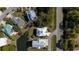 Aerial view showcases the house nestled among trees, with waterfront access at 4240 Highway 17 Business, Murrells Inlet, SC 29576