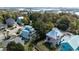 Beautiful aerial view of houses with water views, surrounded by lush trees at 4240 Highway 17 Business, Murrells Inlet, SC 29576