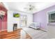 Lovely Bedroom featuring hardwood floors, white furniture, and modern ceiling fan at 4240 Highway 17 Business, Murrells Inlet, SC 29576