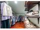 Walk-in closet with organized shelving and plenty of storage space at 4240 Highway 17 Business, Murrells Inlet, SC 29576