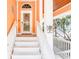 Inviting front entrance with decorative details and a well-lit staircase at 4240 Highway 17 Business, Murrells Inlet, SC 29576