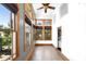 Bright and airy sun room featuring a wall of windows and neutral decor at 4240 Highway 17 Business, Murrells Inlet, SC 29576