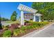 Community entrance sign with manicured landscaping at 5019 Riverton Ct, Myrtle Beach, SC 29579