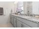 Elegant bathroom vanity featuring double sinks, granite countertops, and chrome fixtures at 524 Farrow Pkwy., Myrtle Beach, SC 29577