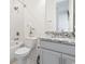 Elegant bathroom with a shower-tub combination, a granite vanity, and a decorative orchid at 524 Farrow Pkwy., Myrtle Beach, SC 29577