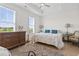 Spacious bedroom with hardwood floors, natural lighting, and a ceiling fan at 524 Farrow Pkwy., Myrtle Beach, SC 29577