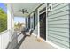 Charming front porch with seating, a ceiling fan, and a 'hello' welcome mat at 524 Farrow Pkwy., Myrtle Beach, SC 29577