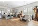 Modern kitchen with stainless steel appliances, gray cabinetry, an island with seating, and hardwood floors at 524 Farrow Pkwy., Myrtle Beach, SC 29577