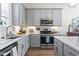 Charming kitchen with stainless steel oven and bright countertops, offering modern appeal at 524 Farrow Pkwy., Myrtle Beach, SC 29577