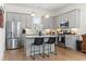 Well-equipped kitchen with stainless steel appliances, a center island, and sleek gray cabinets at 524 Farrow Pkwy., Myrtle Beach, SC 29577