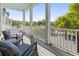 Inviting front porch with rocking chairs and a view of the neighborhood at 524 Farrow Pkwy., Myrtle Beach, SC 29577