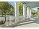 Relaxing porch view overlooking a quiet street and lush greenery at 524 Farrow Pkwy., Myrtle Beach, SC 29577