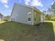 Home's exterior showcasing the well-maintained siding and windows, surrounded by a green lawn at 5333 Abbey Park Loop, Myrtle Beach, SC 29579