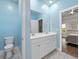 Well-lit bathroom with double vanity, tile flooring, and separate toilet area at 5333 Abbey Park Loop, Myrtle Beach, SC 29579