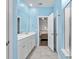 Bathroom with double vanity, tile flooring, separate toilet area, and access to bedroom at 5333 Abbey Park Loop, Myrtle Beach, SC 29579