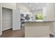 Open kitchen view showcasing granite countertops, stainless steel appliances, and a breakfast bar at 5333 Abbey Park Loop, Myrtle Beach, SC 29579