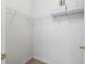 Walk-in closet with white wire shelving and ample storage space at 5801 Oyster Catcher Dr. # 912, North Myrtle Beach, SC 29582