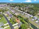Picturesque aerial view of a quiet neighborhood, water features, and a house near coastal amenities at 584 Circle Dr., Surfside Beach, SC 29575