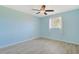 Bright bedroom with new floors, a ceiling fan, and plenty of natural light at 584 Circle Dr., Surfside Beach, SC 29575