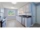 Updated kitchen featuring stainless appliances, granite counters, and ample cabinet space at 584 Circle Dr., Surfside Beach, SC 29575