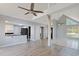 Inviting living area with vaulted ceilings offers a view to the modern kitchen at 584 Circle Dr., Surfside Beach, SC 29575