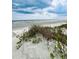 Picturesque beach view showcases the sandy shore and distant ocean horizon at 6000 Ocean Blvd. N # 108, North Myrtle Beach, SC 29582
