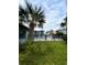 Inviting community pool area with lush landscaping and comfortable lounging at 6000 Ocean Blvd. N # 108, North Myrtle Beach, SC 29582