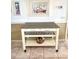 A charming kitchen cart with a granite top, perfect for serving drinks or displaying decor at 6000 Ocean Blvd. N # 108, North Myrtle Beach, SC 29582