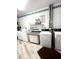 Bright laundry room featuring modern washing machines and convenient countertop space at 6000 Ocean Blvd. N # 108, North Myrtle Beach, SC 29582