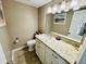 Cozy powder room featuring granite vanity and decorative accents at 6001 - 1322 S Kings Hwy., Myrtle Beach, SC 29575