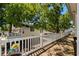 Expansive deck with white railing provides ample outdoor space with a view of the surrounding area at 6001-8050 S Kings Hwy., Myrtle Beach, SC 29575