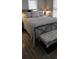 Bedroom with metal bed frame, wooden floors, and lots of light from shuttered windows at 6001-Z55 South Kings Hwy., Myrtle Beach, SC 29575