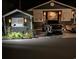 Night view of home with exterior plants, pickup truck and other parked car at 6001-Z55 South Kings Hwy., Myrtle Beach, SC 29575