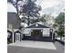 Charming home featuring a boat dock, a wall decorated with greenery, and a quaint shed at 6001-Z55 South Kings Hwy., Myrtle Beach, SC 29575