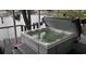 Relaxing hot tub on a wooden deck overlooking a serene waterfront at 6001-Z55 South Kings Hwy., Myrtle Beach, SC 29575