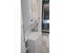 Laundry area features stacked washer/dryer combination with white cabinets and hardware at 6001-Z55 South Kings Hwy., Myrtle Beach, SC 29575