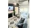 Cozy living room features built-ins, a fireplace, and modern decor at 6001-Z55 South Kings Hwy., Myrtle Beach, SC 29575