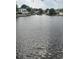 Scenic water view of a glistening pond and multiple surrounding homes and trees at 6001-Z55 South Kings Hwy., Myrtle Beach, SC 29575